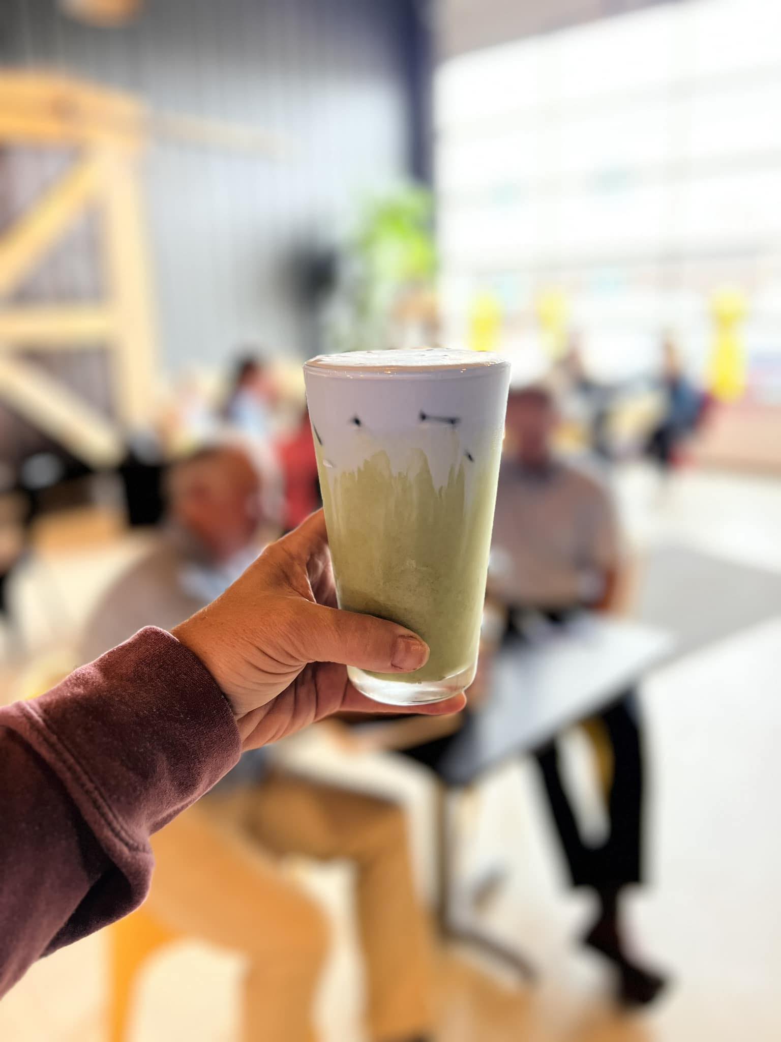 Matcha latte with purple cold foam